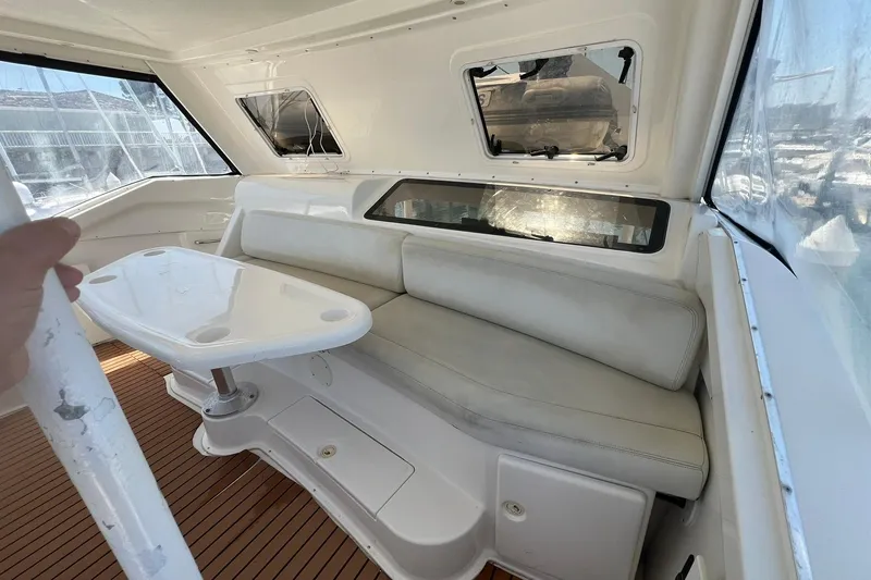 Slide: The Image of Interior of 2000 Silverton 453 Motor Yacht with seating and table. - 10