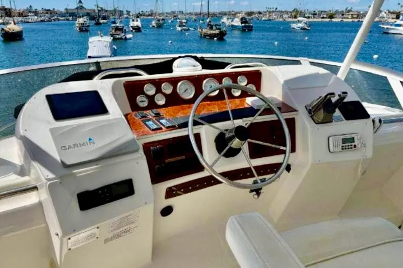 Slide: The Image of Cockpit view of 2000 Silverton 453 Motor Yacht with Garmin navigation system. - 6