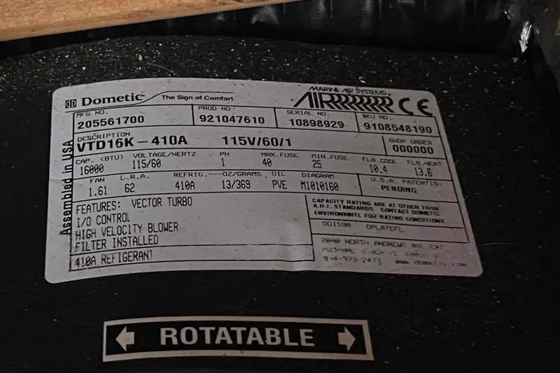 Slide: The Image of Label on Dometic air conditioning unit, model VTD16K-410A, featuring vector turbo and high velocity blower. - 44