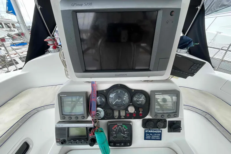 Slide: The Image of Cockpit of 2000 Hunter 410 sailboat with navigation instruments and GPS display. - 55