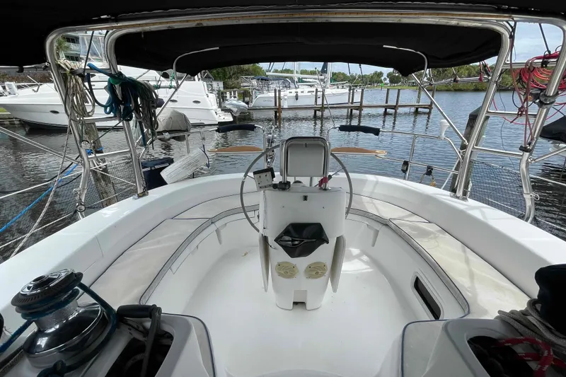 Slide: The Image of Cockpit view of 2000 Hunter 410 sailboat docked at marina. - 57