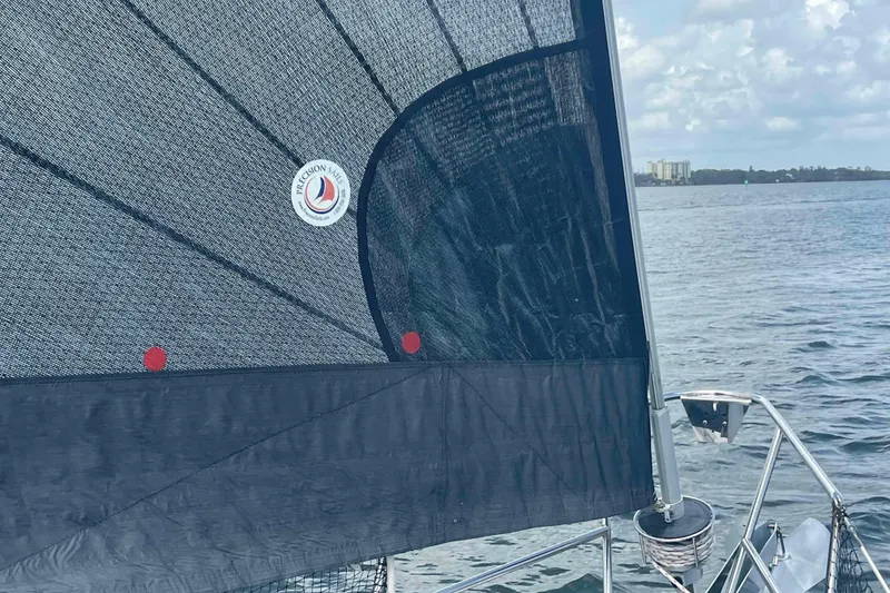 Slide: The Image of Sailboat with Precision Sails on water, Hunter 410 model, 2000. - 64