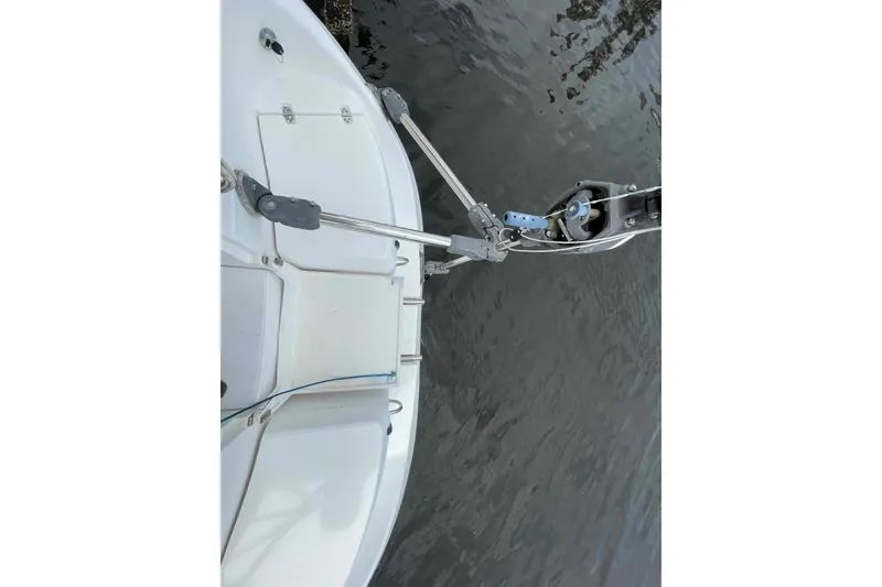 Slide: The Image of Bow of a 2000 Hunter 410 sailboat with anchor and fittings visible. - 70