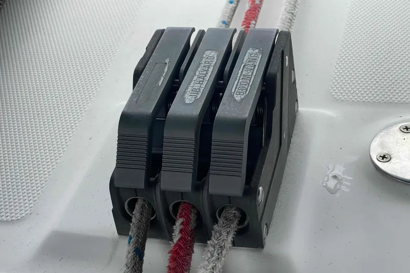 Slide: The Image of Close-up of rope clutches on a 2000 Hunter 410 sailboat deck. - 73