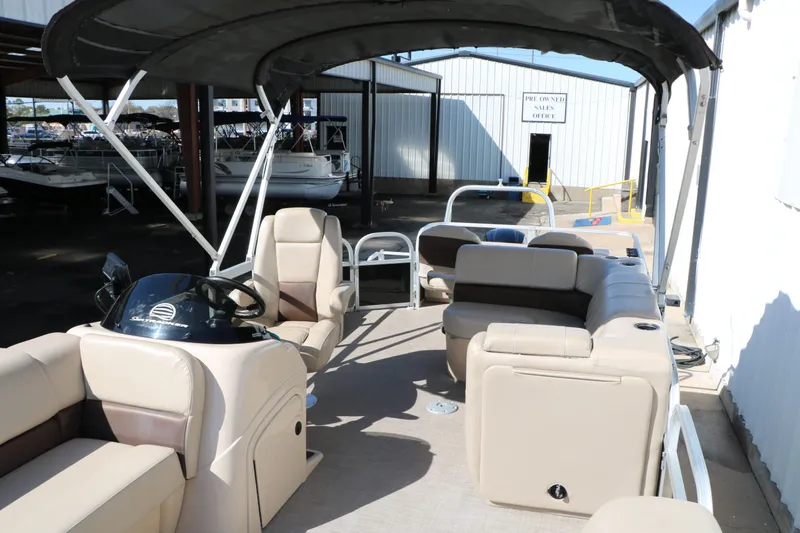 Slide: The Image of Interior view of a 2019 Sun Tracker Sport 22 Fish Deluxe pontoon boat. - 22