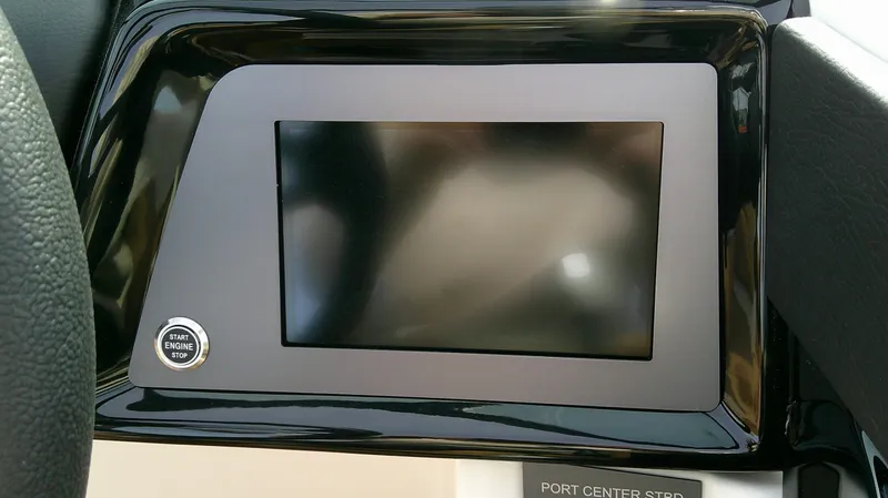 Slide: The Image of MasterCraft NXT24 2026 dashboard with start button and screen. - 13