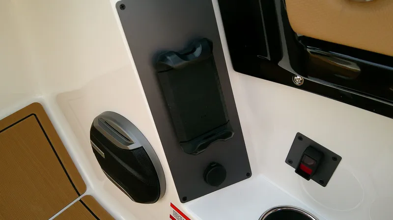 Slide: The Image of Interior view of 2026 MasterCraft NXT24 with speaker and switch. - 14