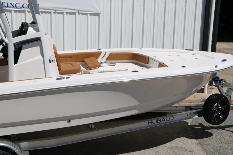 Slide: The Image of 2026 Robalo 246 Cayman boat on trailer, side view. - 15