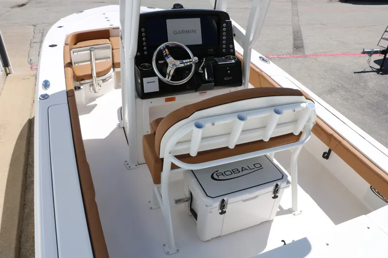 Slide: The Image of Interior view of the 2026 Robalo 246 Cayman boat model. - 16