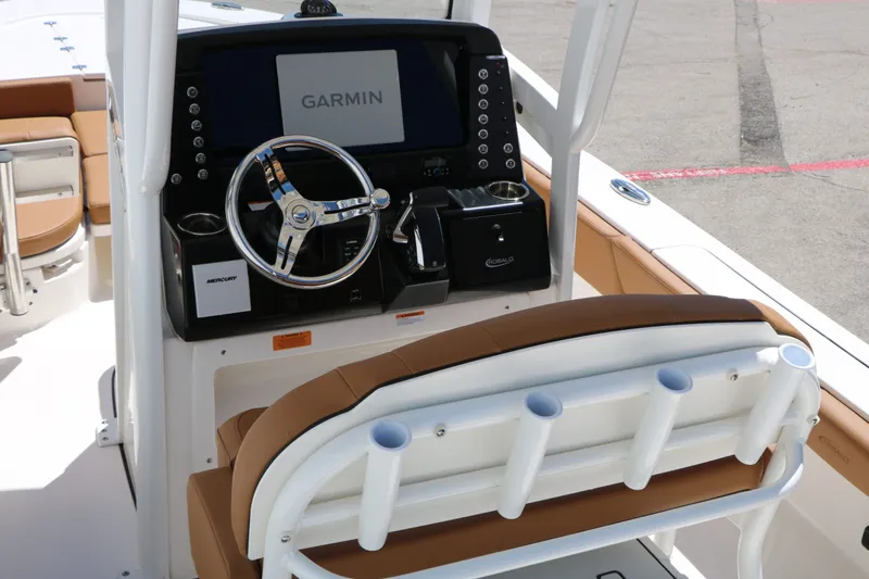 Slide: The Image of Interior view of 2026 Robalo 246 Cayman boat with Garmin controls. - 17
