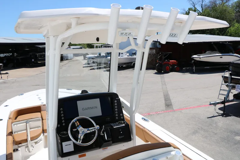 Slide: The Image of 2026 Robalo 246 Cayman boat with Garmin navigation system. - 19