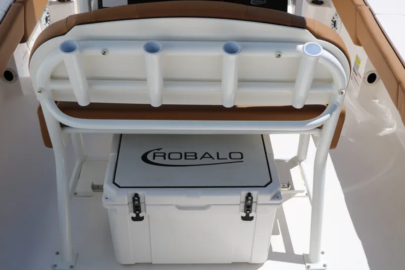 Slide: The Image of Robalo 246 Cayman 2026 boat with rod holders and cooler. - 21
