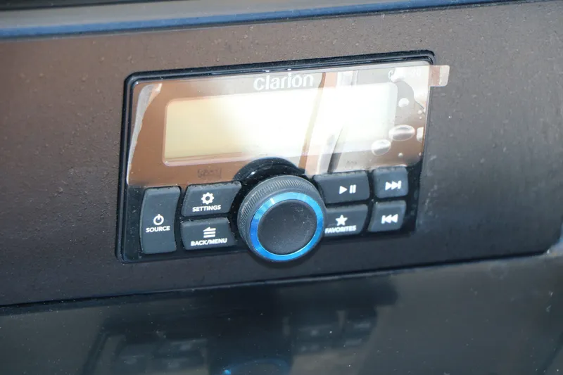 Slide: The Image of Clarion audio system in Robalo 246 Cayman 2026 boat. - 34