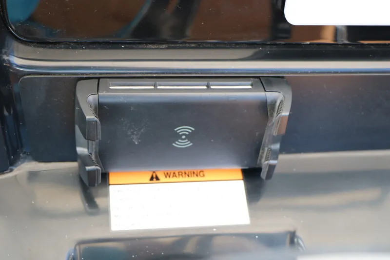 Slide: The Image of Wireless charger on Robalo 246 Cayman 2026 boat. - 36
