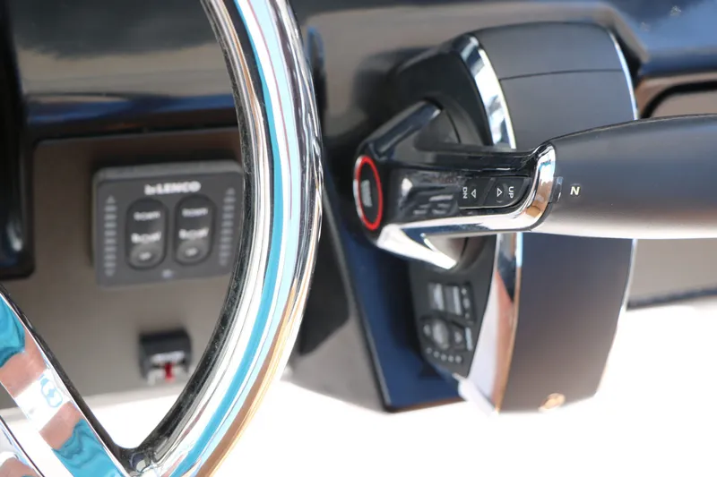 Slide: The Image of Close-up of the control area on a 2026 Robalo 246 Cayman. - 37