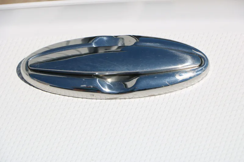 Slide: The Image of Close-up of a shiny boat hatch on Robalo 246 Cayman. - 41