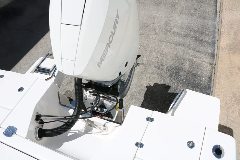 Slide: The Image of Robalo 246 Cayman 2026 with Mercury outboard motor, top view. - 44