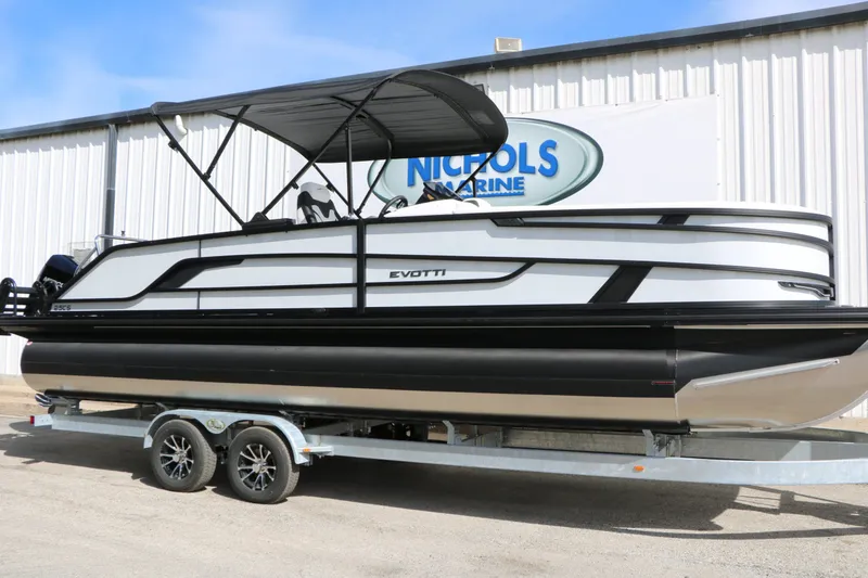 Slide: The Image of 2026 Evotti 725 CS Tri Toon pontoon boat on trailer. - 3
