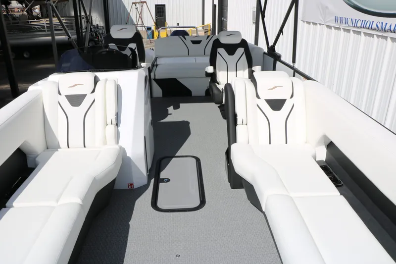 Slide: The Image of Interior of 2026 Evotti 725 CS Tri Toon with luxurious white seating. - 32