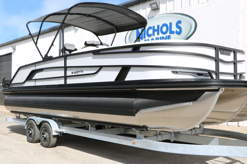 Slide: The Image of Evotti 725 CS Tri Toon 2026 on trailer at Nichols Marine. - 5