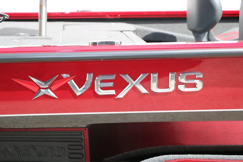 Slide: The Image of Close-up of Vexus AVX 1985s logo on red boat, year 2026. - 16