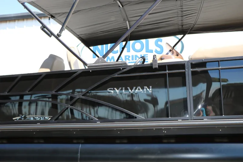 Slide: The Image of Sylvan Mirage X3 Party Fish Tri Toon 2026 at Nichols Marine. - 13