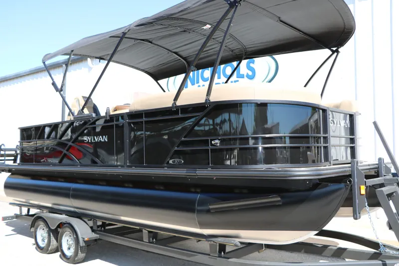 Slide: The Image of 2026 Sylvan Mirage X3 Party Fish Tri Toon on trailer. - 3