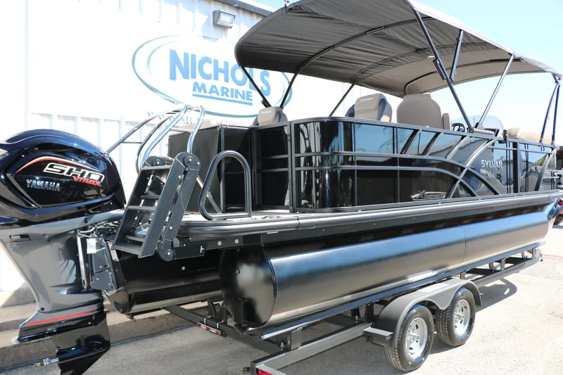 Slide: The Image of 2026 Sylvan Mirage X3 Party Fish Tri Toon on trailer. - 5