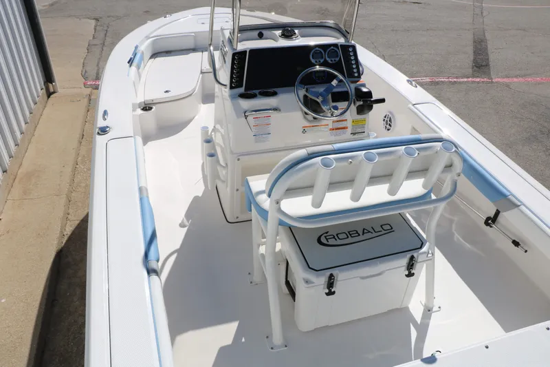 Slide: The Image of Interior view of the 2026 Robalo 226 Cayman boat model. - 17