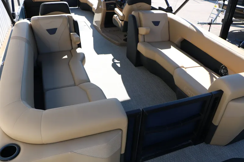 Slide: The Image of Interior of 2026 Evotti 525 QL Tri Toon with beige seating. - 21