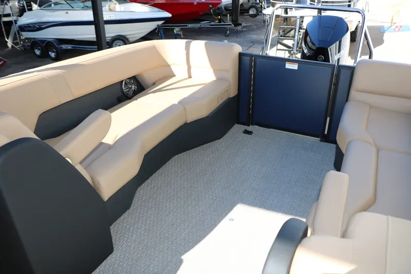 Slide: The Image of Interior of 2026 Evotti 525 QL Tri Toon with beige seating. - 43
