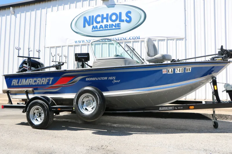 The Image of 2008 Alumacraft Dominator 165 Sport boat on trailer. - 1