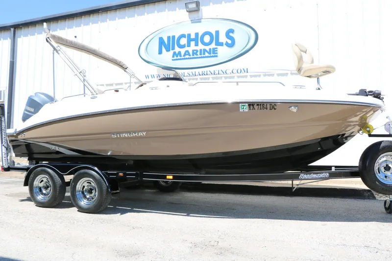 The Image of 2015 Stingray 192 SC boat on trailer at Nichols Marine. - 1