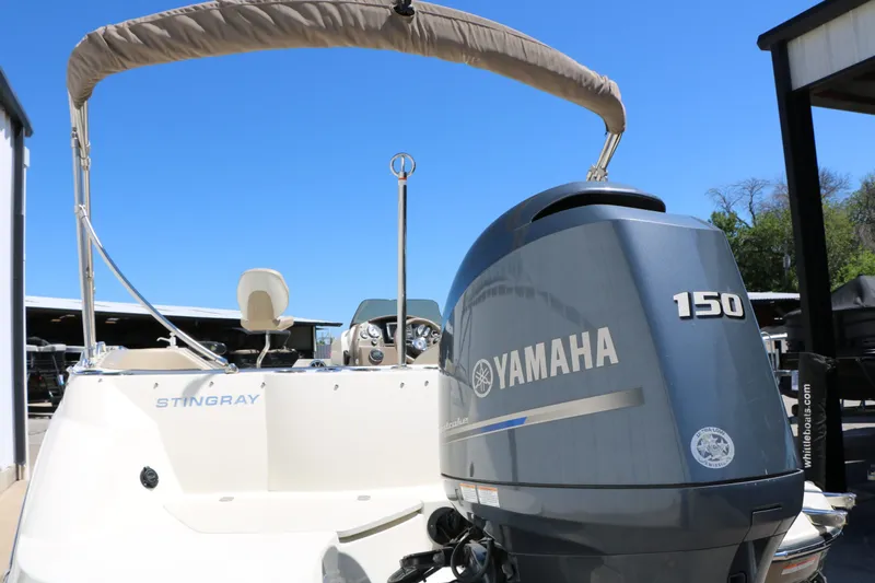 Slide: The Image of 2015 Stingray 192 SC boat with Yamaha 150 engine. - 12