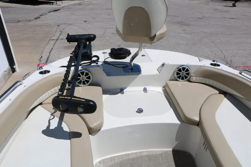 Slide: The Image of Interior view of a 2015 Stingray 192 SC boat with seating area. - 34