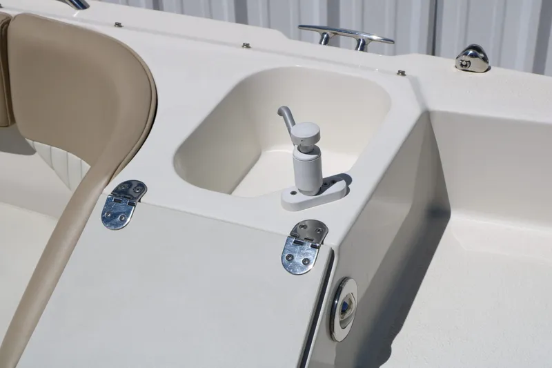 Slide: The Image of Close-up of 2015 Stingray 192 SC boat deck with sink. - 38