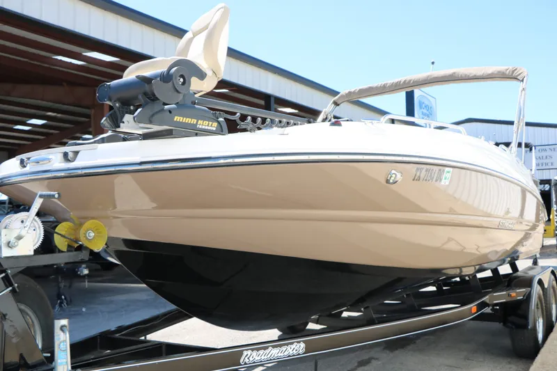 Slide: The Image of 2015 Stingray 192 SC boat on trailer in warehouse. - 7