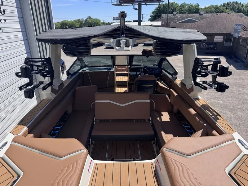 Slide: The Image of Interior view of 2026 Nautique Super Air Nautique G25 boat. - 14