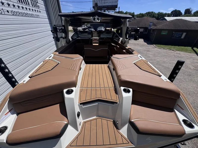 Slide: The Image of 2026 Nautique Super Air Nautique G25 with luxurious interior design. - 15