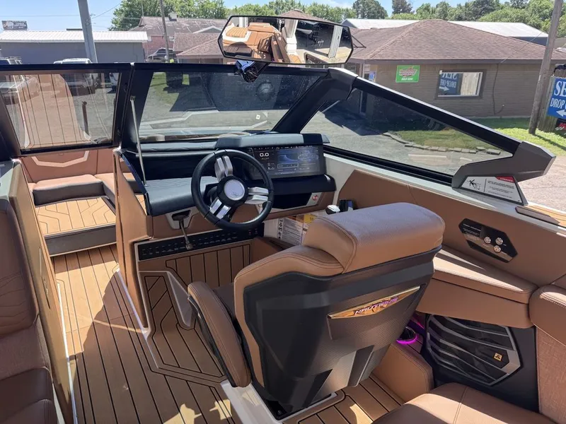 Slide: The Image of Interior of 2026 Nautique Super Air Nautique G25 with modern cockpit. - 4