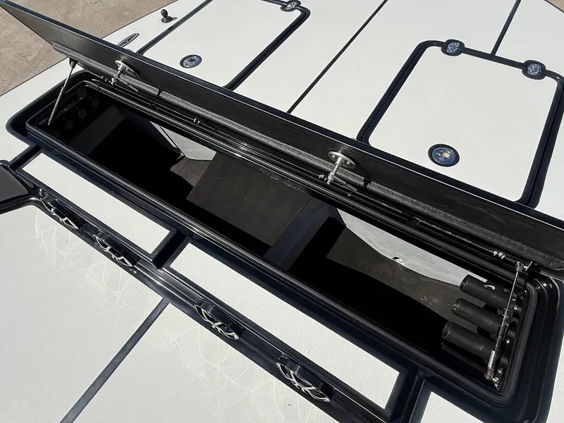Slide: The Image of Mamba 24 Cat Elite 2025 boat hatch with storage compartment. - 14