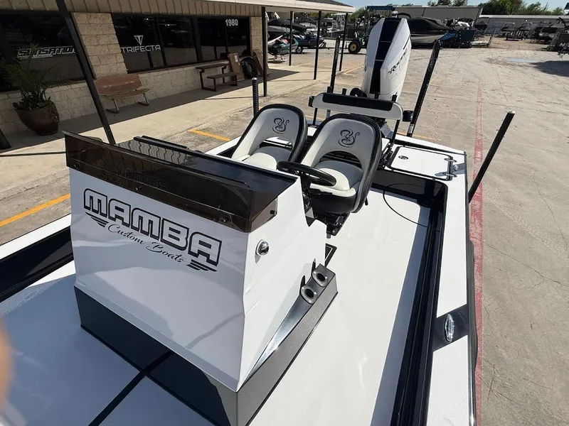 Slide: The Image of Mamba 24 Cat Elite 2025 boat with dual seats and motor. - 20