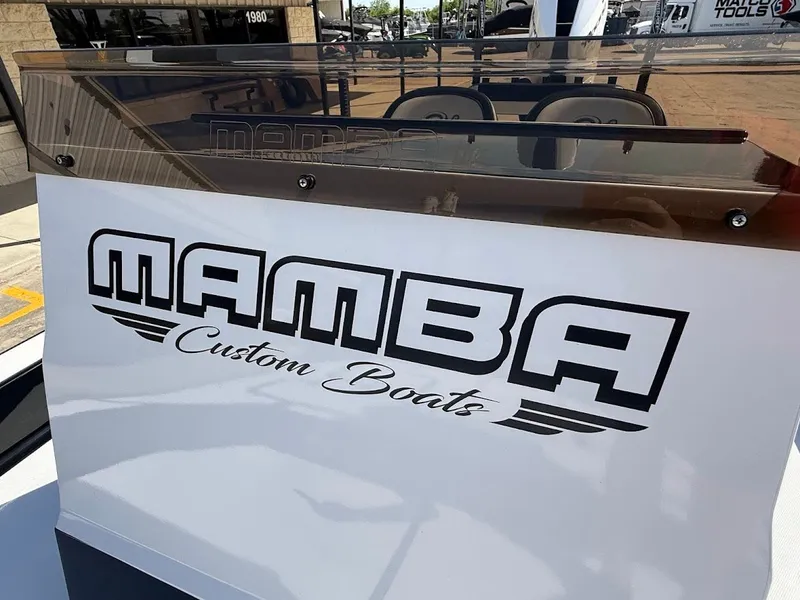 Slide: The Image of Mamba Custom Boats logo on 2025 24 Cat Elite model. - 22