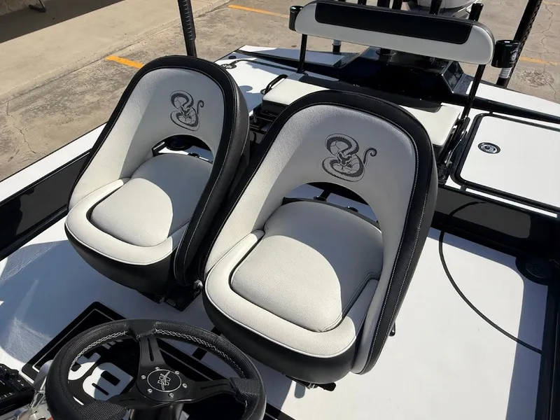 Slide: The Image of Mamba 24 Cat Elite 2025 boat seats with snake design. - 23