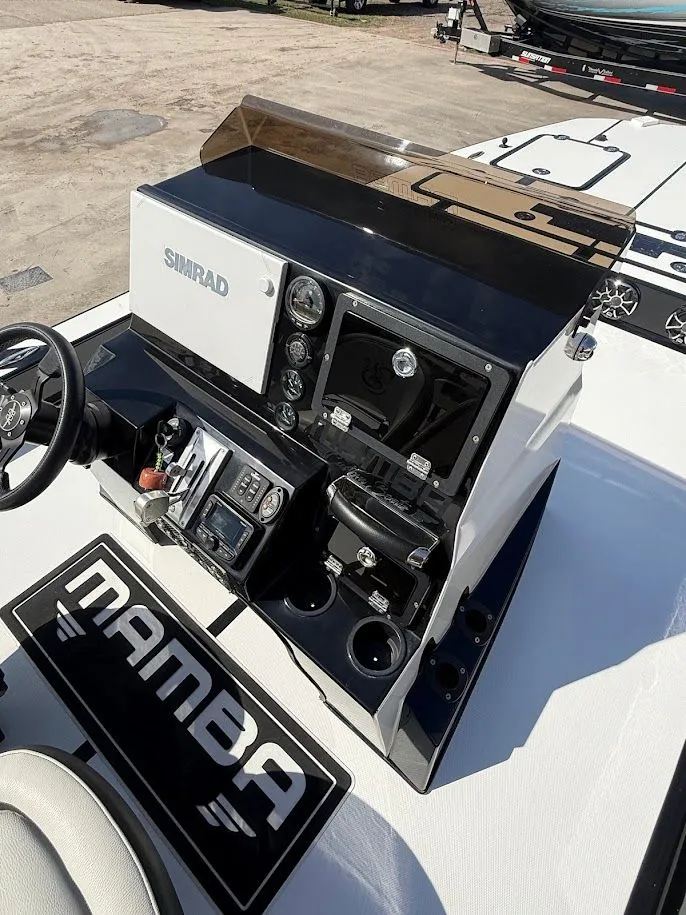 Slide: The Image of Mamba 24 Cat Elite 2025 boat console with Simrad technology. - 25
