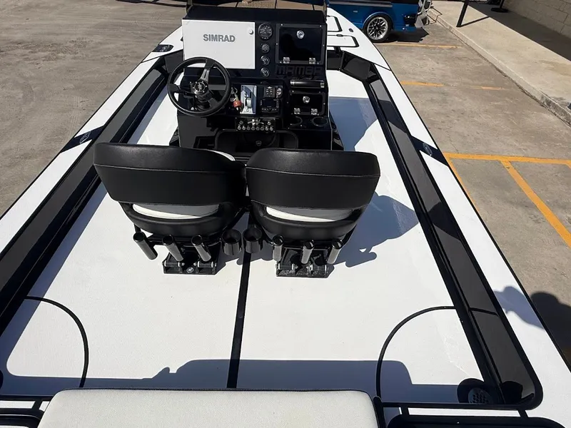 Slide: The Image of Interior view of Mamba 24 Cat Elite 2025 with helm console. - 26