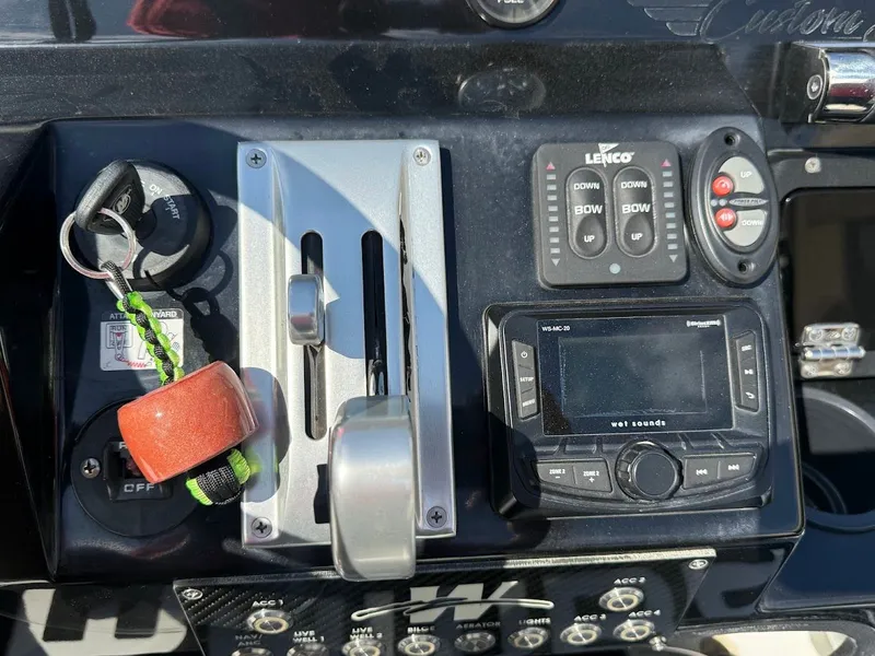 Slide: The Image of Dashboard of Mamba 24 Cat Elite 2025 with controls and display. - 28