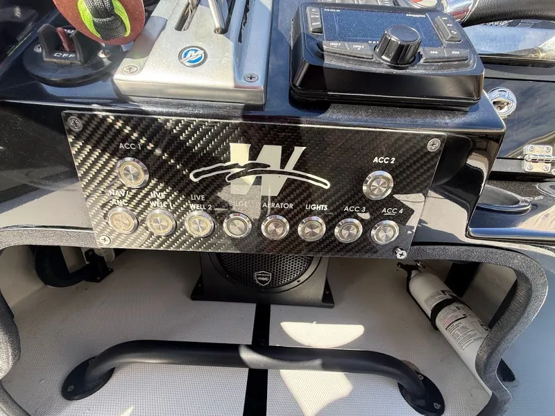Slide: The Image of 2025 Mamba 24 Cat Elite boat control panel close-up. - 30