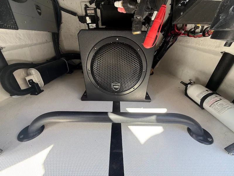 Slide: The Image of Interior of Mamba 24 Cat Elite 2025 with speaker and fire extinguisher. - 31