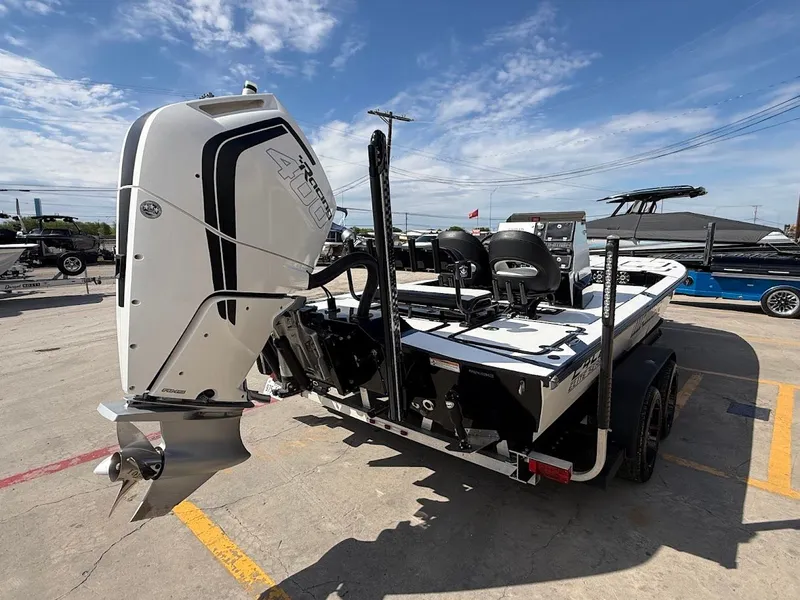 Slide: The Image of 2025 Mamba 24 Cat Elite boat with powerful outboard motor. - 6